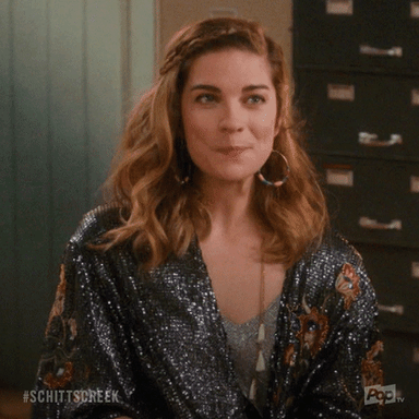 Alexis Rose schitt's creek alexis rose hair flip
